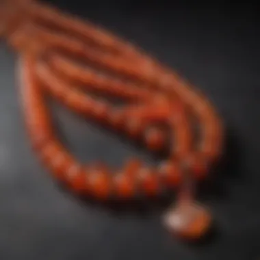 A collection of authentic carnelian mala beads with labels indicating their origins and properties.