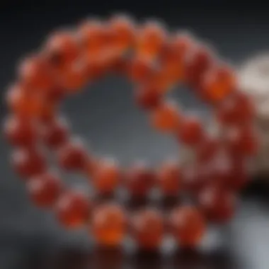 A close-up view of polished carnelian mala beads showcasing their vibrant hues and textures.