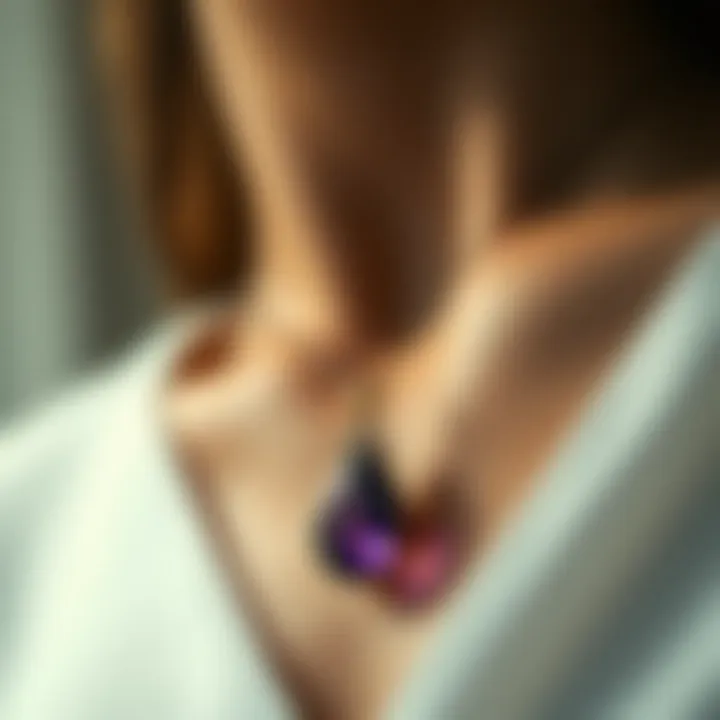 Charoite Pendant in Fashion An elegant charoite pendant being worn in a sophisticated setting.