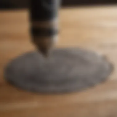 Dremel engraving tool on a wooden surface