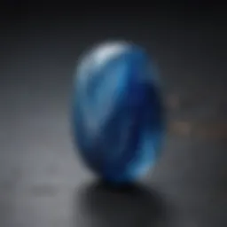 A close-up view of a polished kyanite cabochon showcasing its rich blue hues and unique texture.