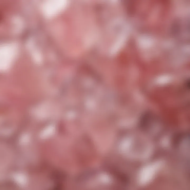 A close-up view showcasing the translucence and natural patterns of rose quartz crystals.