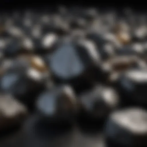 A close-up view of polished shungite stones reflecting light