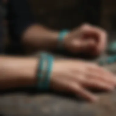 Artisan crafting a real turquoise bracelet, highlighting meticulous attention to detail and skill