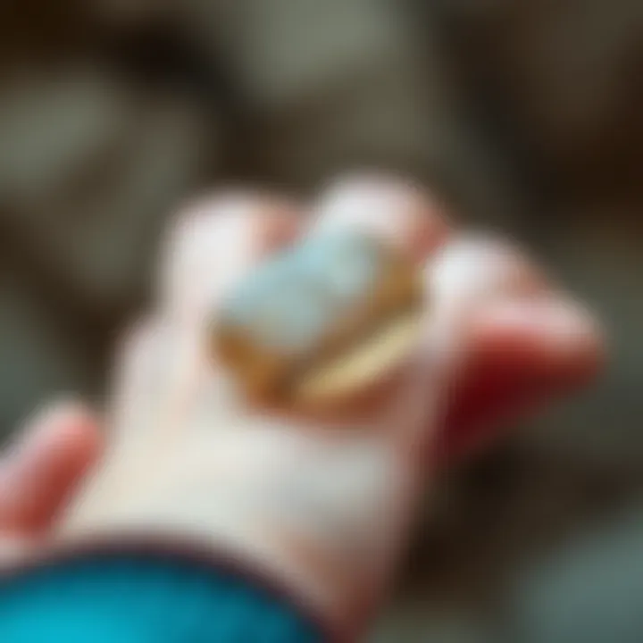 Tactile Engagement with Worry Stones Close-up of a worry stone being held between fingers