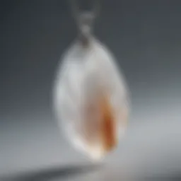 A close-up view of a selenite crystal pendant showcasing its translucent beauty and unique striations