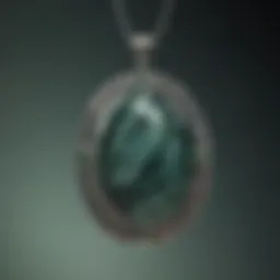 Close-up view of a seraphinite pendant showcasing its unique green and silver patterns