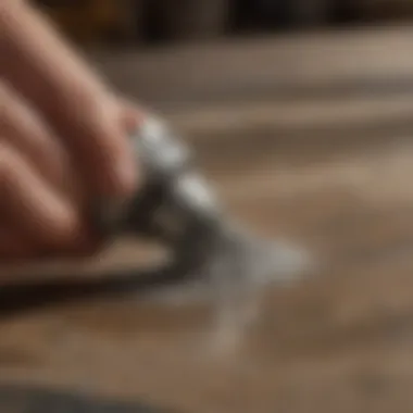 Close-up of wet sanding technique in action