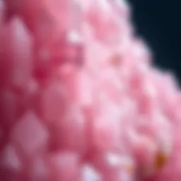 A close-up view of pink quartz crystal showcasing its unique hexagonal structure and translucent hues.