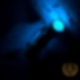 A sleek black light flashlight illuminating a dark space