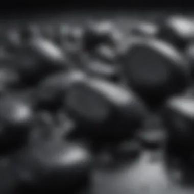 Aesthetic Arrangement of Sparkling Black Rocks A collection of sparkling black rocks arranged aesthetically