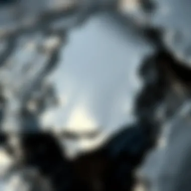 Glossy Surface of Obsidian Close-up of obsidian's glossy surface reflecting light