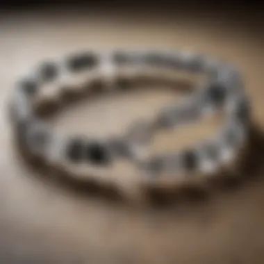 Aesthetic Appeal of Tourmalinated Quartz Bracelets Beautifully displayed tourmalinated quartz bracelets on a textured surface