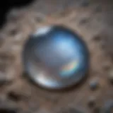 Close-up view of a polished moonstone showcasing its adularescent glow